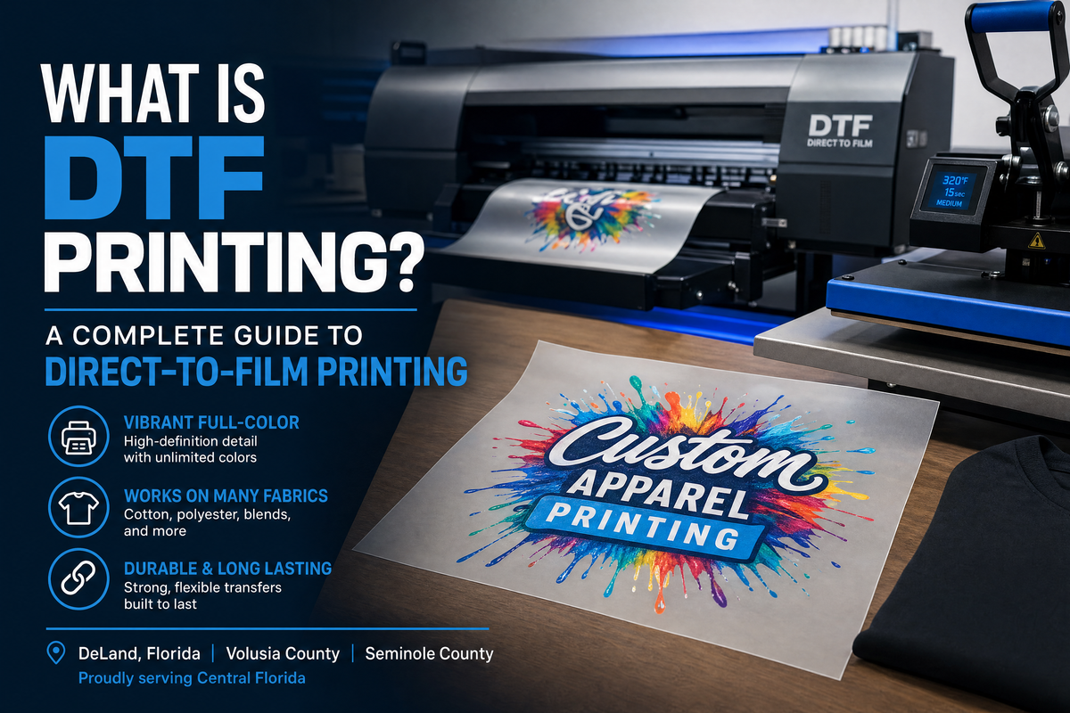Featured banner for What is DTF Printing? A Complete Guide to Direct-to-Film Printing showing a colorful DTF transfer sheet and printing equipment at Qwik Tees in DeLand, Florida.