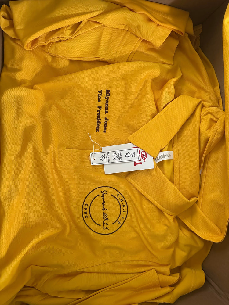 Yellow custom embroidered polo shirt for local schools and sports teams created by Qwik Tees in DeLand FL, Volusia County.