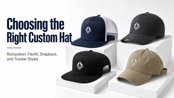 Four custom hat styles compared: navy trucker cap, charcoal fitted cap, black flat brim snapback, and khaki dad cap