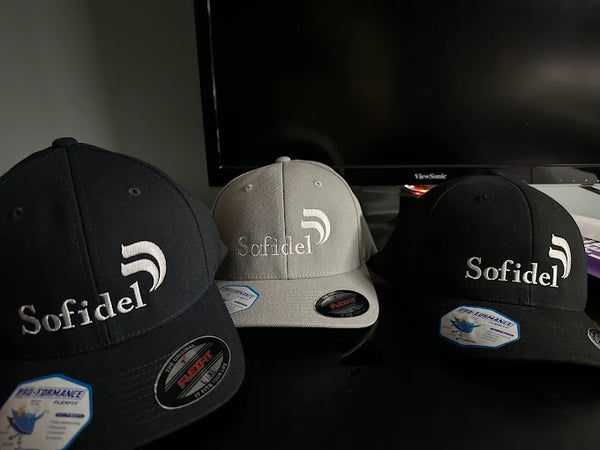 Custom embroidered hat featuring a local business logo, produced by Qwik Tees in DeLand for customers across Volusia County.