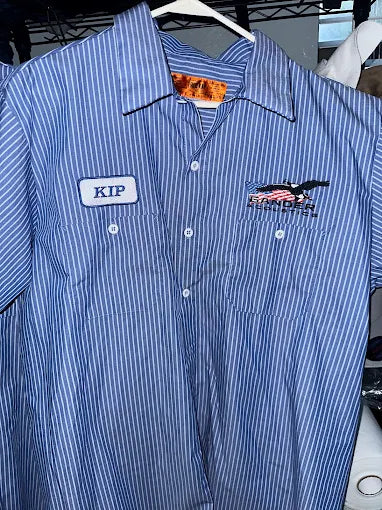 High-quality embroidered work shirts with KIP and company logos, printed locally in DeLand, Florida for businesses across Volusia County.